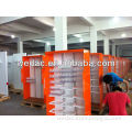 Cosmetic shop display stand with pushers